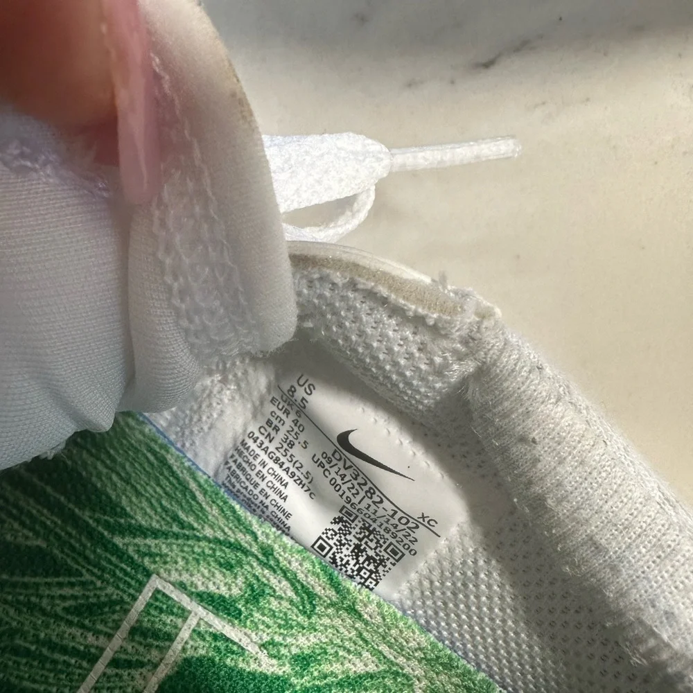 Nike White and Green Athletic Shoes with Cushioned Sole